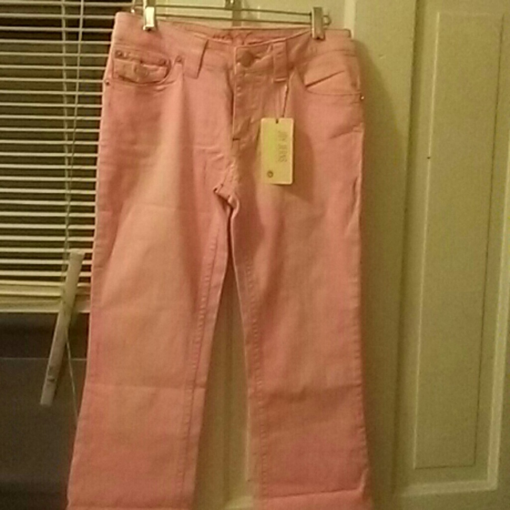 Powered pink with brown and tan stitching